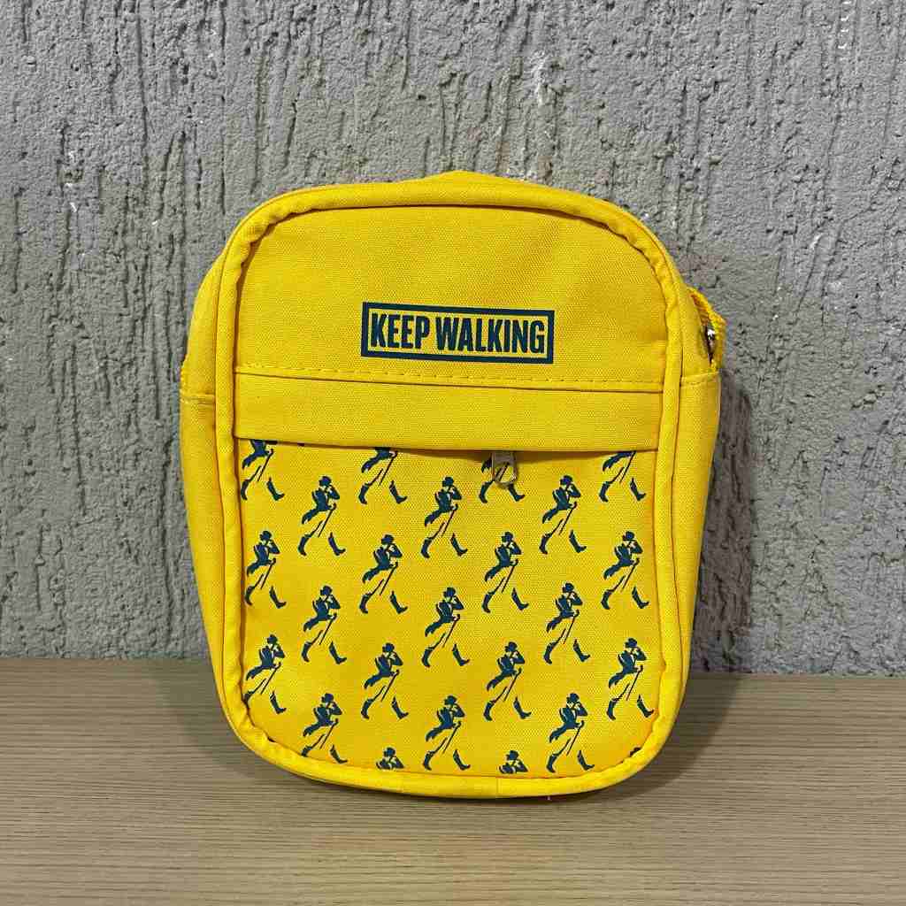 BOLSA JOHNNIE WALKER KEEP WALKING AMARELA